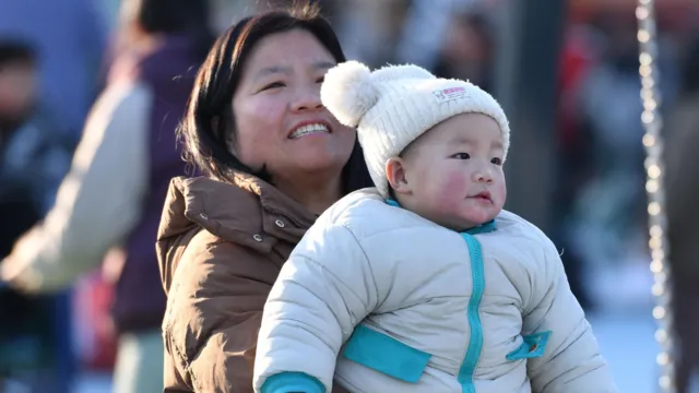 China offers parents $1,500 in bid to boost births,